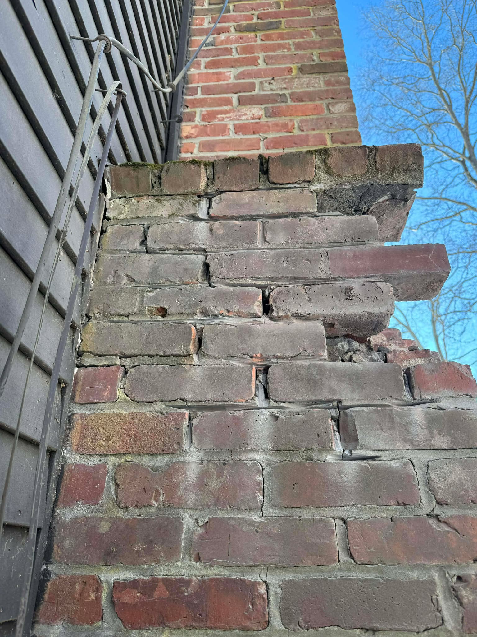Chimney masonry repair tuckpointing in Dorchester MA by Elite Chimney